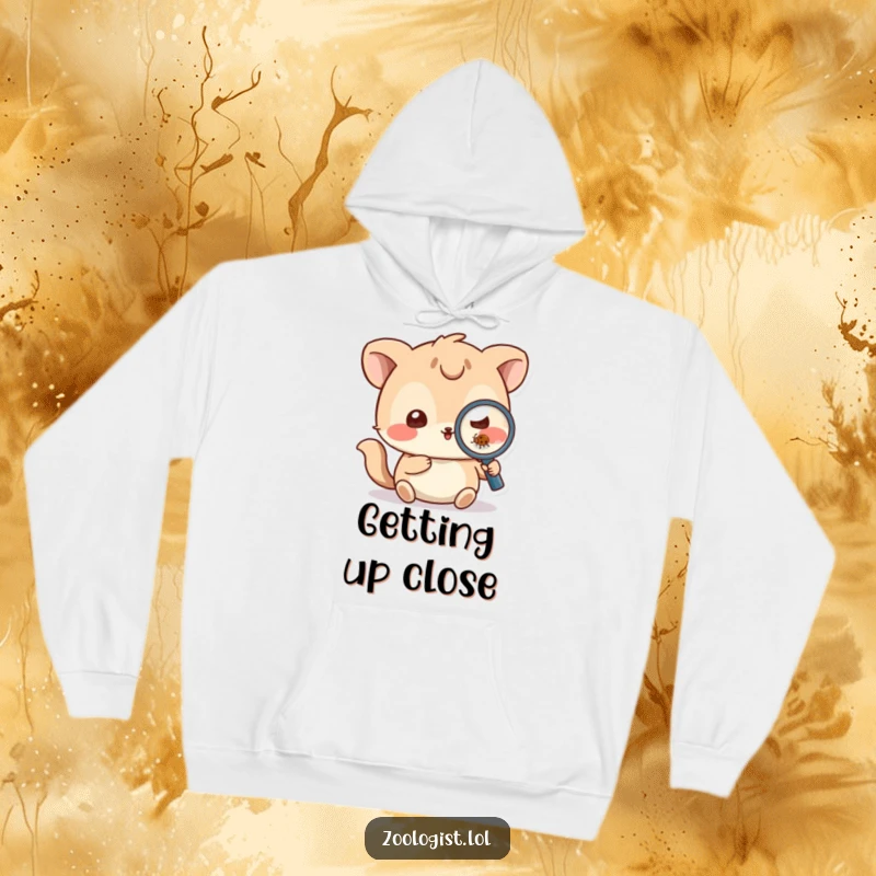 Funny Hoodie: Playful animal character uses a magnifying glass to inspect a small bug, exuding a funny investigative vibe.