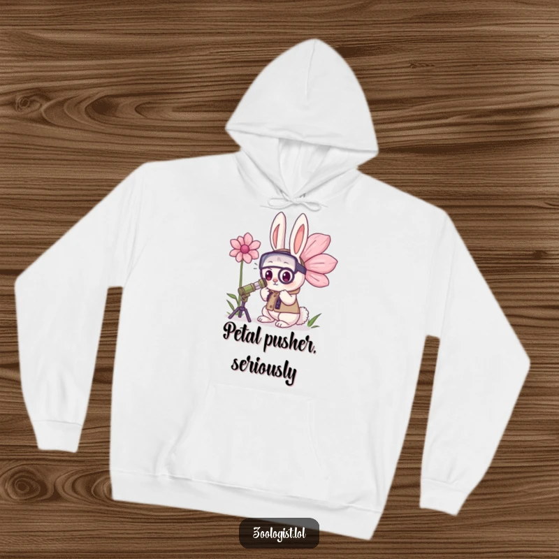 Funny Kawaii Rabbit Zoologist Hoodie: A determined Kawaii rabbit zoologist studies a giant flower, offering warmth and humorous botanical charm.