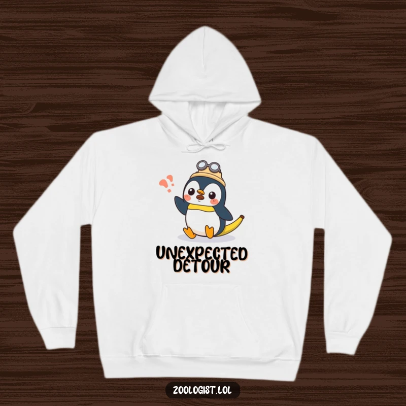 Funny surprised Kawaii penguin zoologist character slipping on a banana peel, comfortable hoodie for comedy lovers, funny gift.