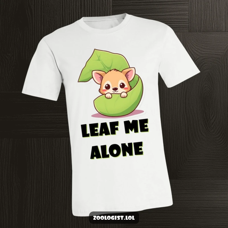 Funny curious animal t-shirt showing a cute creature peeking out from behind a giant leaf, inviting discovery.
